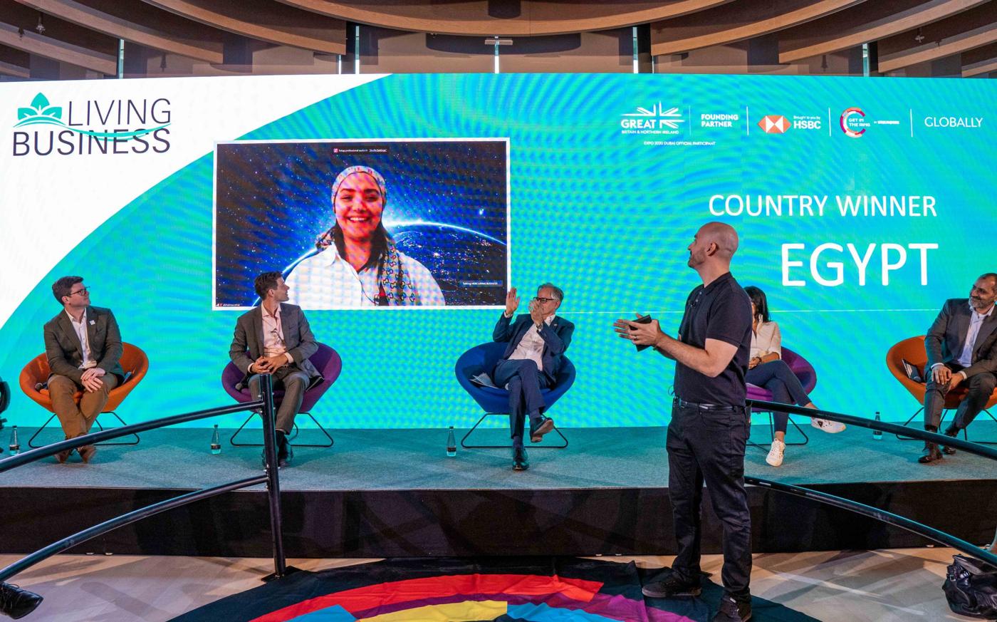 Panel on stage with the country winner for Egypt announced on screen